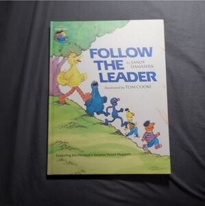 Follow the leader by Sandy Damashek. Hard cover January 1 2002.